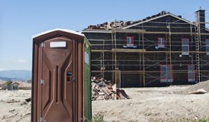 porta potty on a new construction site